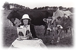 Marsha Sinetar, with cows.